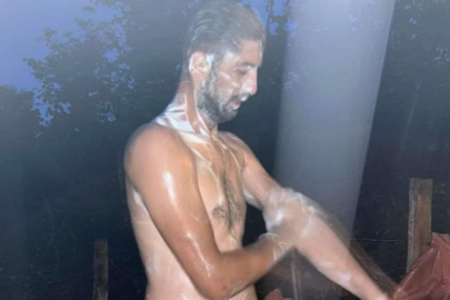 YAĞMUR SUYUYLA DUŞ ALDI