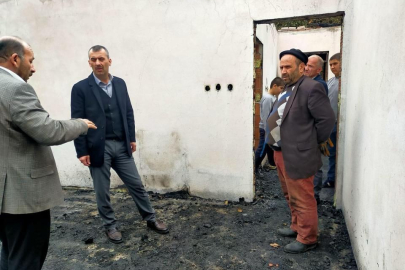 BAŞKANDAN EVİ YANAN AİLELERE ZİYARET 